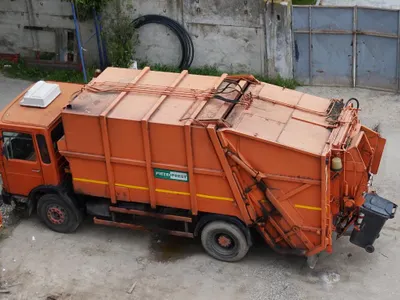 Which type of truck is used for carrying garbage and waste materials?