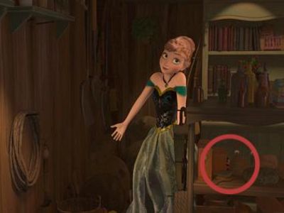 In Oaken's trade shop what is on a shelf (hidden) behind Anna?