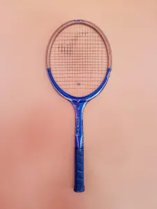 What is the purpose of the backhand grip in Badminton?