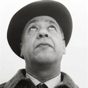 Which famous playwright is associated with the movement known as 'Theater of the Absurd'?