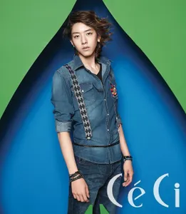 Who is this? Hint: CNBlue Comment: the guy who plays the guiter with bad hair