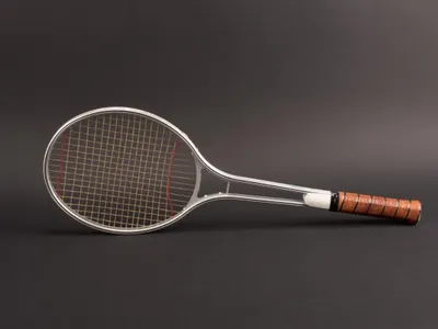 What material is used to make the strings of tennis rackets?