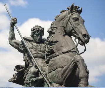 In medieval European folklore, what do dragons often guard?