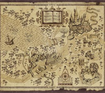 What are the words scrolling across the top of the Marauders Map when George showed the map to Harry?