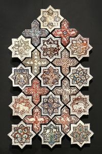 What does the floral design known as 'Islimi' symbolize in Islamic art?