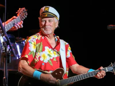 blasting Jimmy Buffett in his earbuds so the whole class could hear