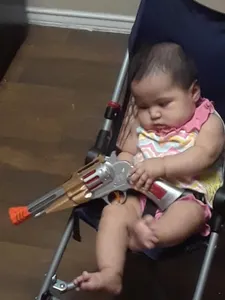 baby with a g u n