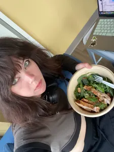 editing photos and eating a salad