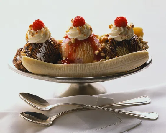 You are sharing a banana split when you notice he has some on his mouth. What do you do?