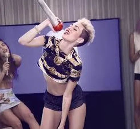 (Please be honest)Lets say you see Miley Cyrus in Wal-Mart wearing nothing but a bikini top and short shorts reading to a group of kindergarteners, what would you say?