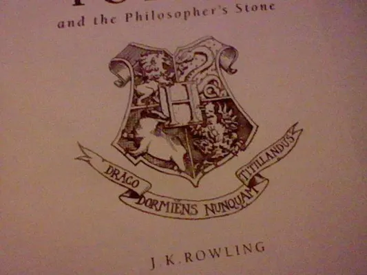 What does "Draco Dormiens Nunquam Titillandus" mean? I was wondering what it meant because it is written at the beginning of every Harry Potter book. What does "Draco Dormiens Nunquam Titillandus" mean? I was wondering what it meant because it is written at the beginning of every Harry Potter book.