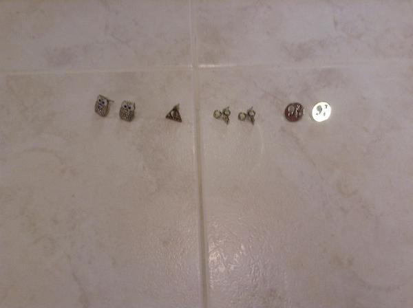 <c:out value='These are my Harry Potter earings... i only have one deathly Halloween tho because I am too lazy to'/>