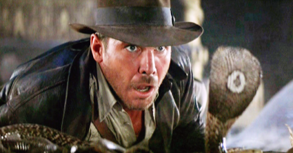 Indiana Jones (first appearing in Raiders of the Lost Ark. The franchise was rebooted many times always starting Harrison Ford) Indiana Jones (first appearing in Raiders of the Lost Ark. The franchise was rebooted many times always starting Harrison Ford)