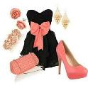 A black strapless dress with a pink bow and pink heels