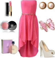A pink strapless dress with white heels A pink strapless dress with white heels