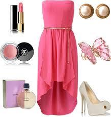 A pink strapless dress with white heels