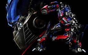 Opitmus Prime (Gets all of his weapons and gadgets) Opitmus Prime (Gets all of his weapons and gadgets)