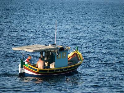 Which boat is typically used for fishing in shallow waters?