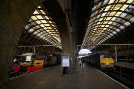 9) At which station and on what platform do students board the train to Hogwarts?
