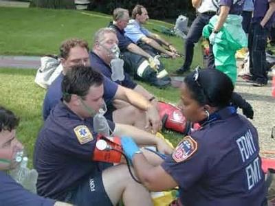A large man falls down infront of you while eating a sandwich. Yes, the EMT's are assisting him, so you have nothing to do but stand there. Do you..