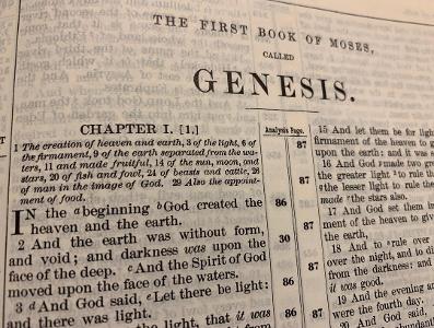 Which prophet wrote the Book of Genesis?