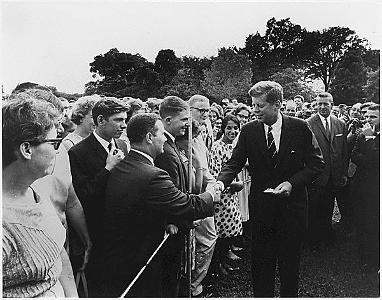 During his tenure, Kennedy created a new organization that used skilled American volunteers to aid underdeveloped countries in need. What was this organization called?