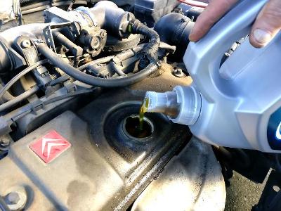 What does an engine Oil Change involve?
