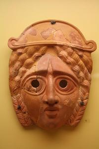 In ancient Greek theater, who wore masks to portray various characters?