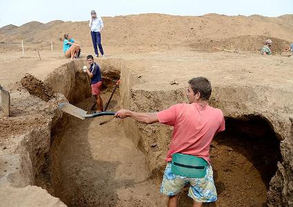 What is the main focus of archaeological excavation?