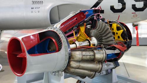 What is the main difference between a turbofan engine and a turbojet engine?