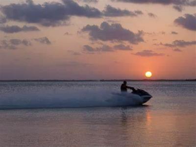 How many people can typically ride a jet ski at a time?