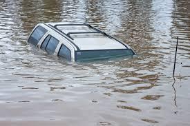 What do you do when you are in a car, and the car is sinking in water?
