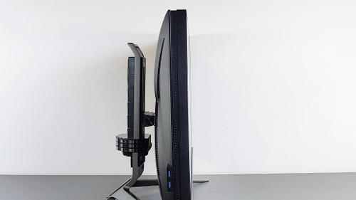 What is the purpose of VESA mounting holes on a monitor?