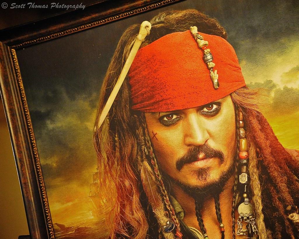 Which actor starred as Captain Jack Sparrow in the 'Pirates of the Caribbean' series?