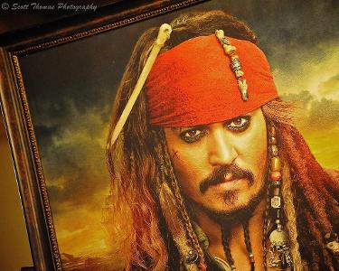 Which actor starred as Captain Jack Sparrow in the 'Pirates of the Caribbean' series?