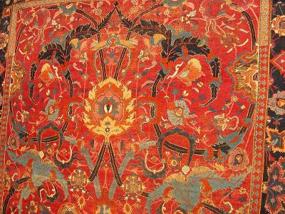 What does the term 'arabesque' refer to in Islamic art?