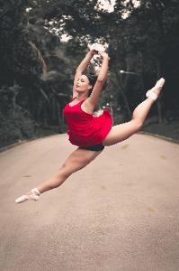 What is the term for a jump where dancers alternate their feet and appear to be walking in the air?