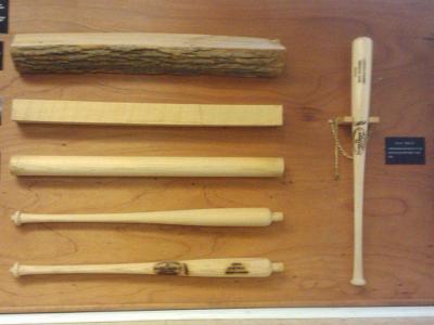 Which material is the baseball bat made of?