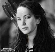 What flower/root gives katniss hope