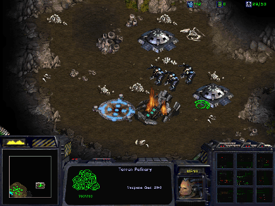 Which strategy game features the factions Terran, Zerg, and Protoss?
