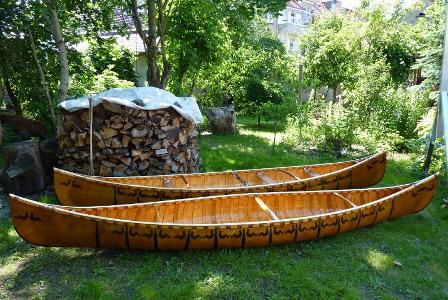 Which material is commonly used to construct canoes?