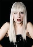 Do you think lady gaga is ugly ? (hey im just asking becuase my cousin is asking me 10 times!