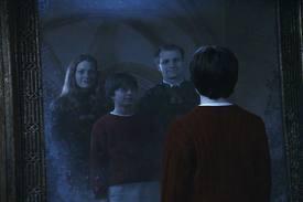 which one of these characters was teh professor who told harry at the end of their conversation that he looked very much like his father and had also inherited his fathers talent for trouble?
