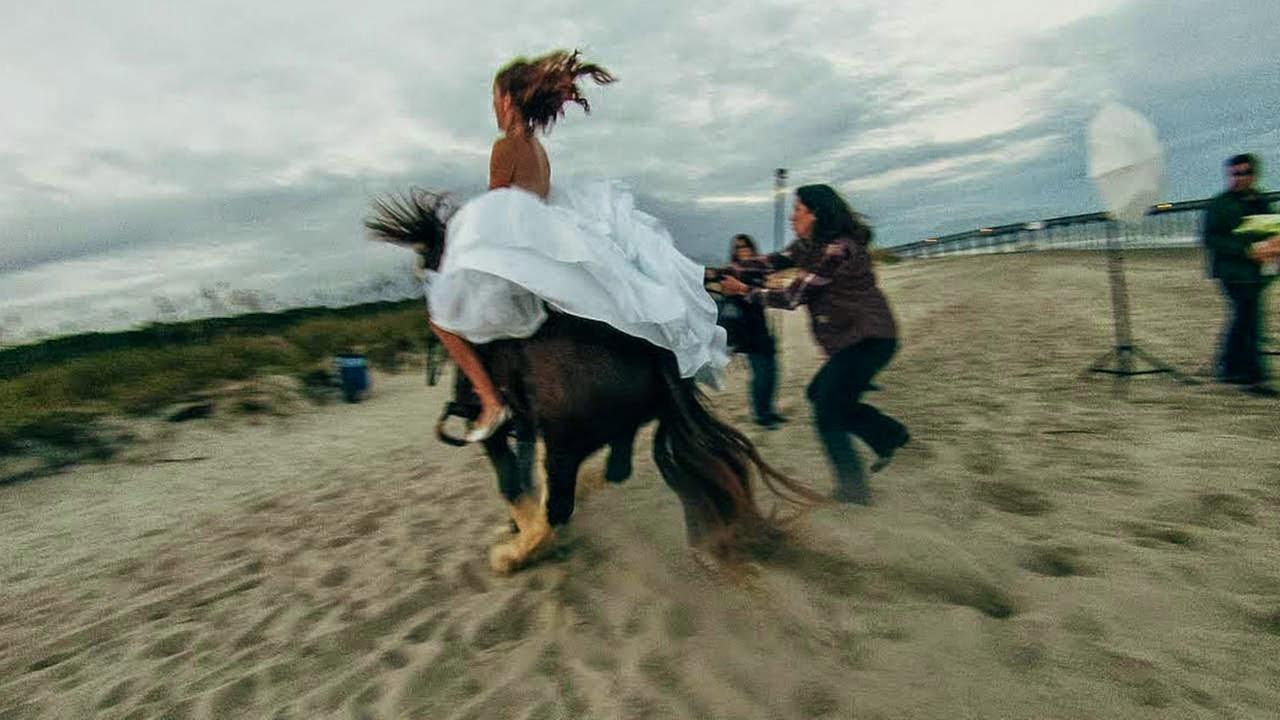 Which designer is known for her wedding dresses?