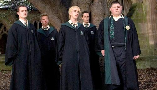 You are walking through a corridor and see a kid who you don't know being bullied by Slytherins. What do you do?