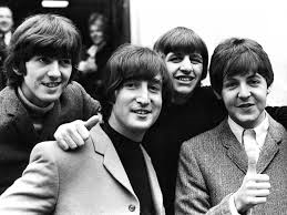 What Song Was The Beatles first hit in Great Britain?