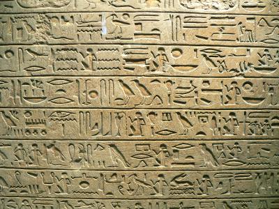 What did Ancient Egyptians use to write on?