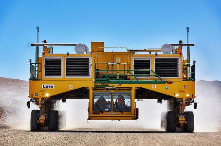 What type of truck is specifically designed to carry heavy loads in construction sites?