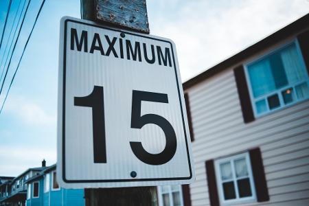 What is the maximum speed limit on residential streets in most areas?