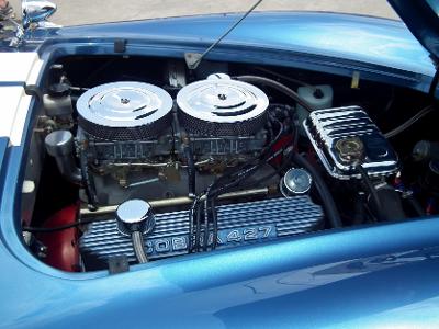What is the engine size of a Shelby Cobra's V8 engine?